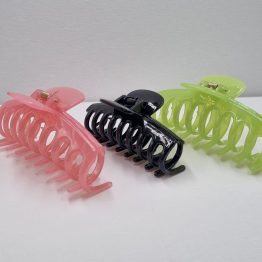 Hair claw clip in pink green and black